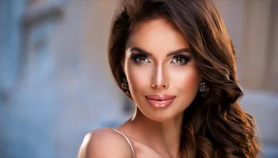 Portrait Of A Beautiful Woman With Wavy Brown Hair