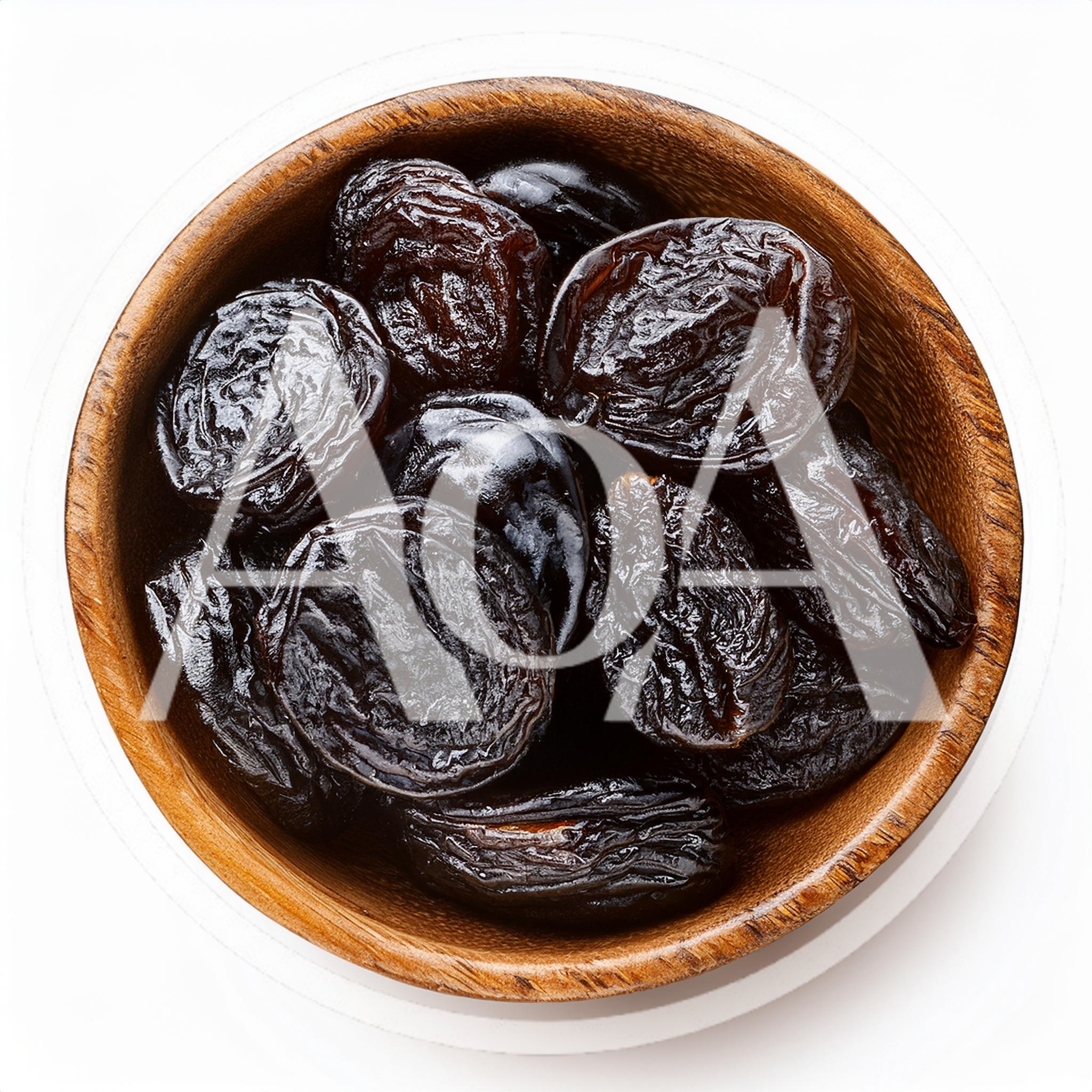 Dried Prunes In A Wooden Bowl