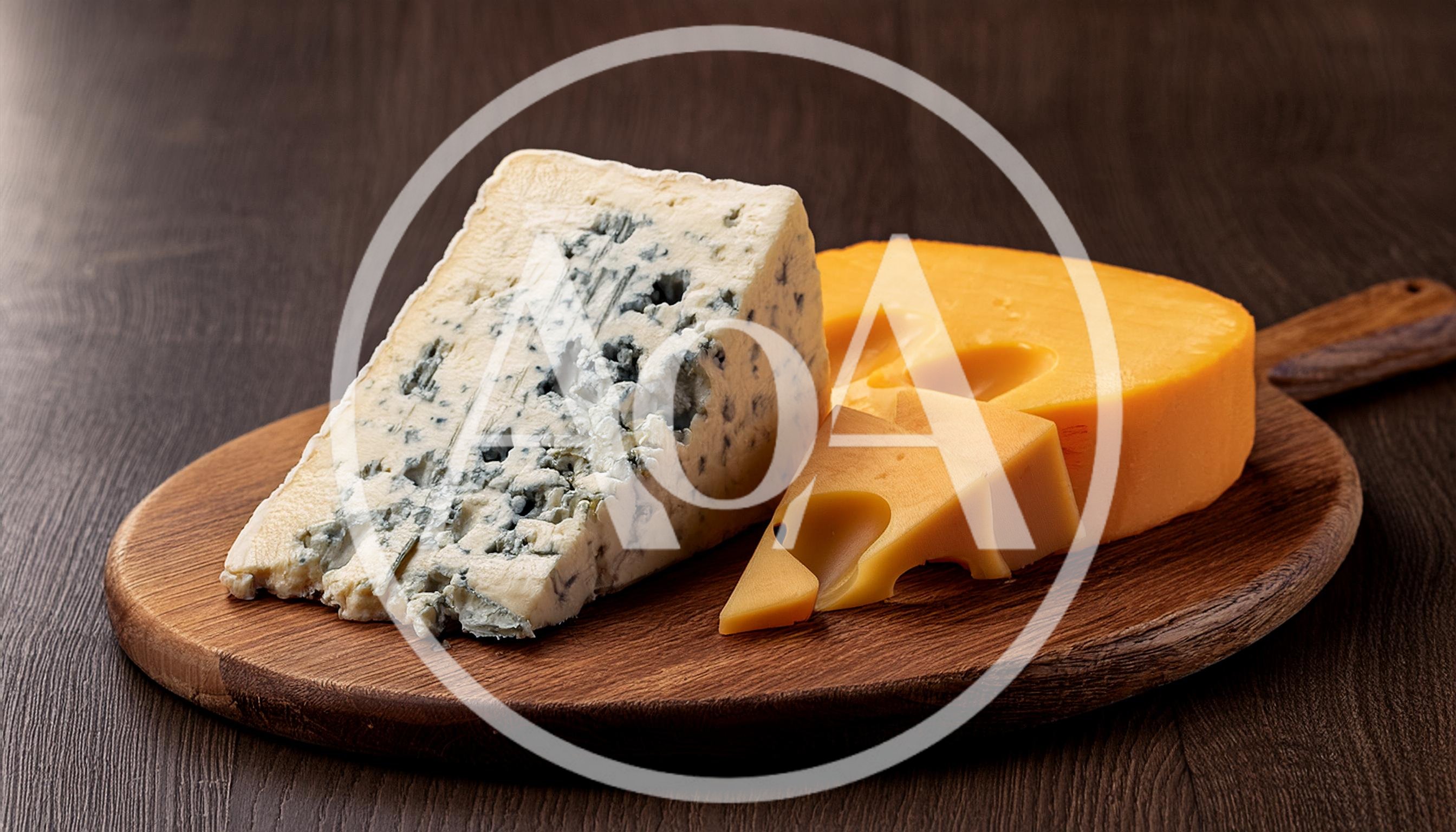 Wedge Of Blue Cheese And Sliced Yellow Cheese