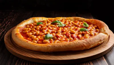 Baked Bean Pizza On A Wooden Serving Board