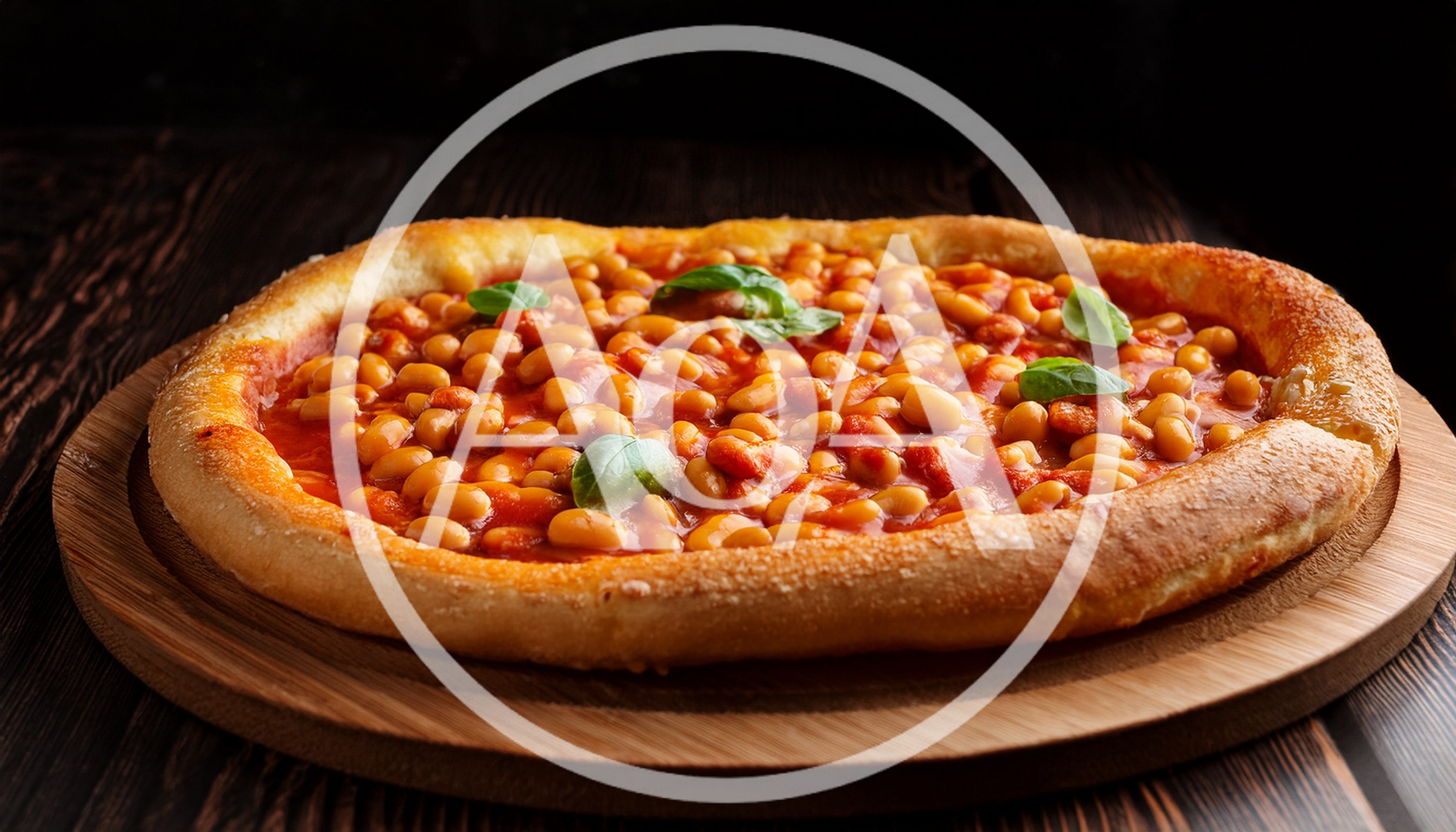Baked Bean Pizza On A Wooden Serving Board