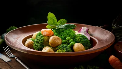 Steamed Broccoli and Potato Salad in Clay Bowl