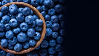 Fresh Blueberries In A Wooden Bowl