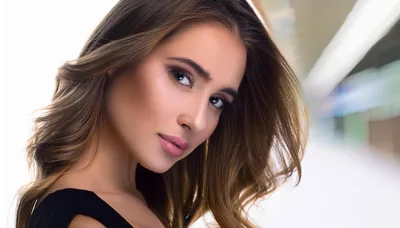 Portrait Of A Beautiful Young Woman With Wavy Hair
