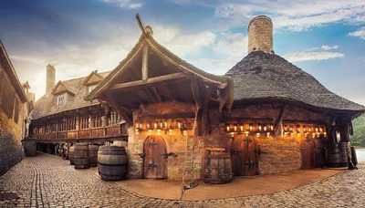 Medieval Tavern Exterior With Stone Walls And Wooden Roof