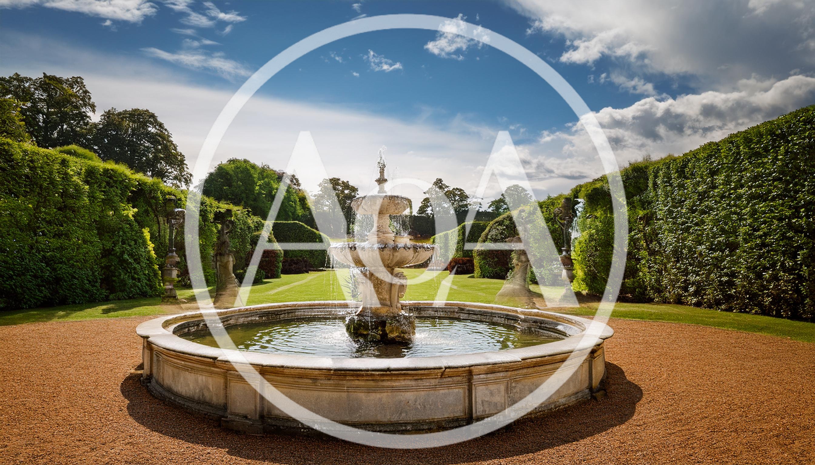 Ornate Stone Fountain In A Formal English Garden
