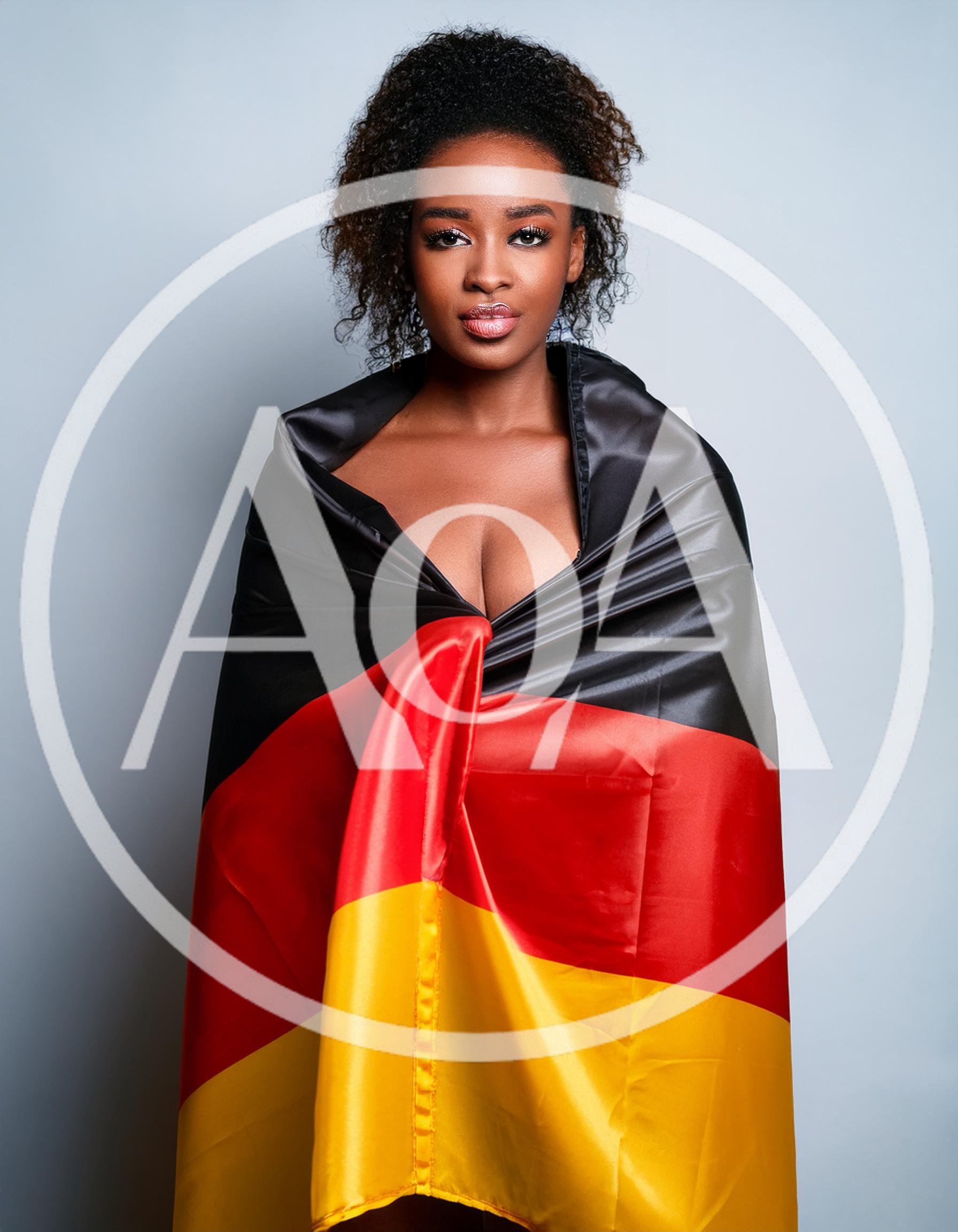 Portrait Of A Woman Wrapped In A German Flag