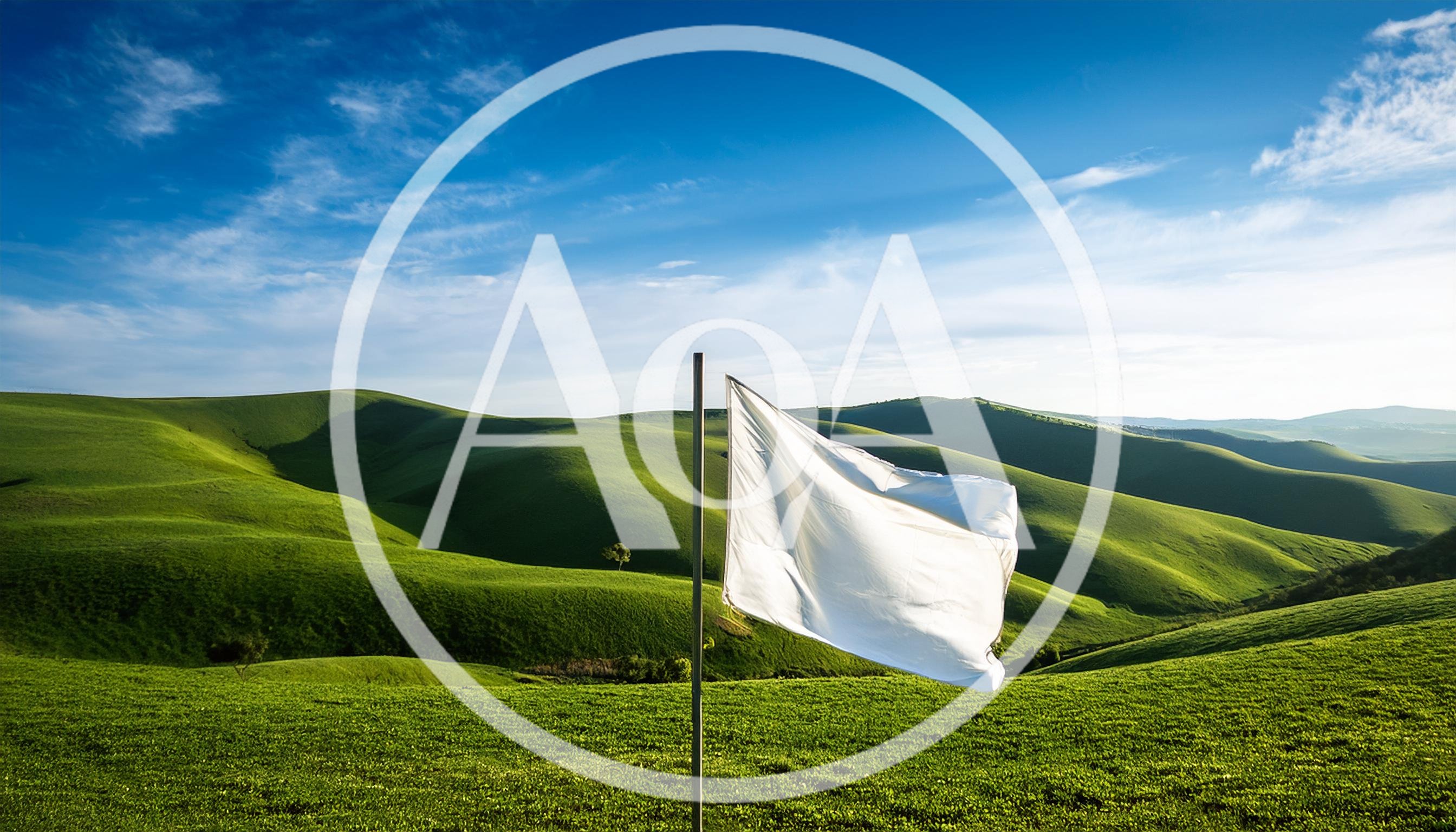 White Flag Waving Over Rolling Green Hills