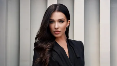 Portrait Of A Sophisticated Woman In A Black Suit