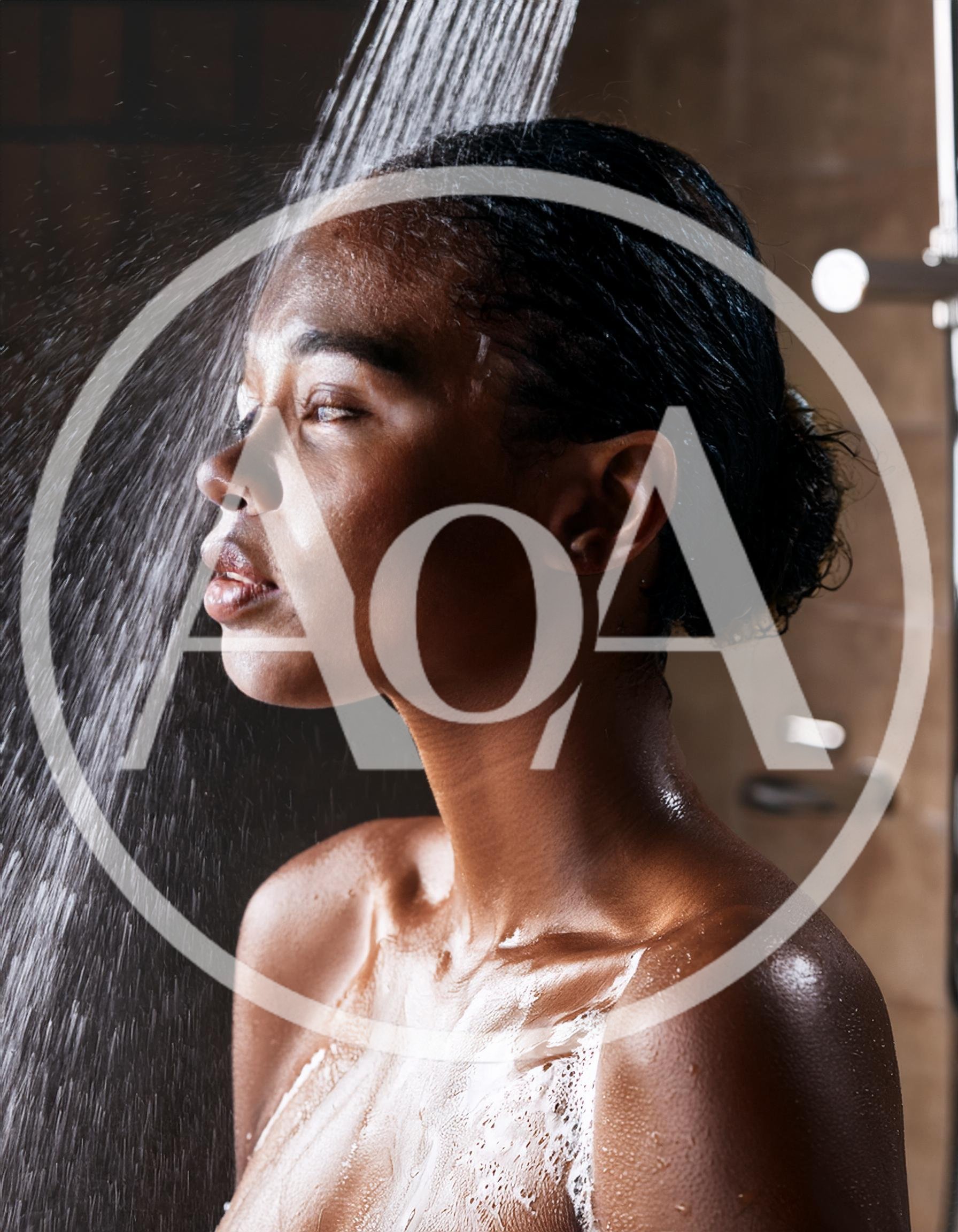 Young Black Woman Taking A Refreshing Shower