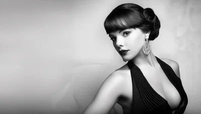 Elegant Woman With Vintage Hairstyle And Statement Earrings