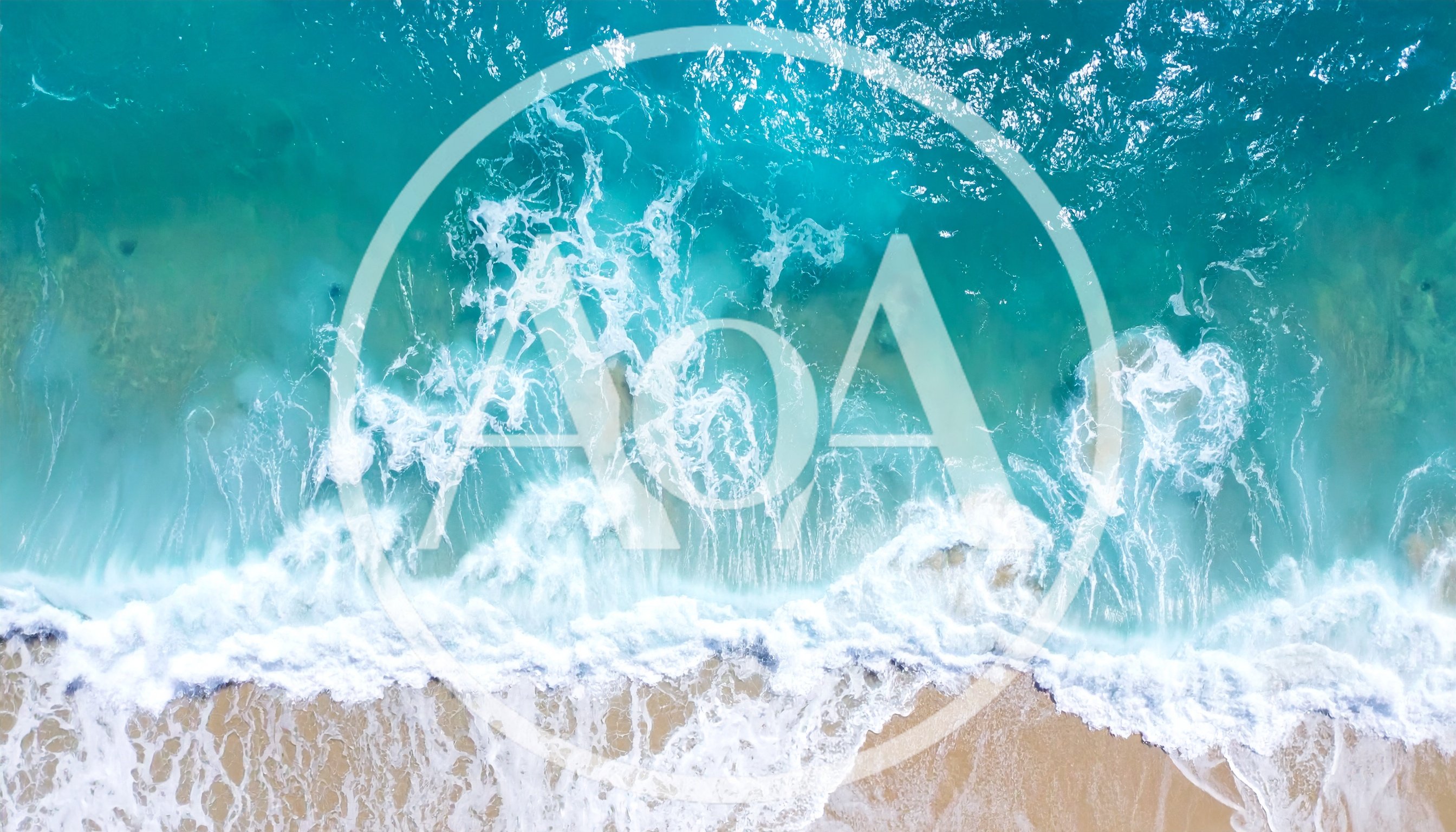 Aerial View Of Turquoise Ocean Waves Crashing On Beach