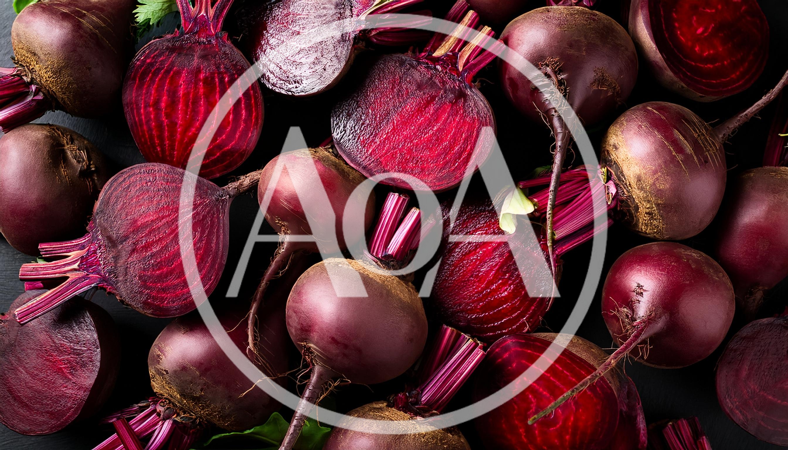 Fresh Whole And Sliced Red Beetroots On Dark Background
