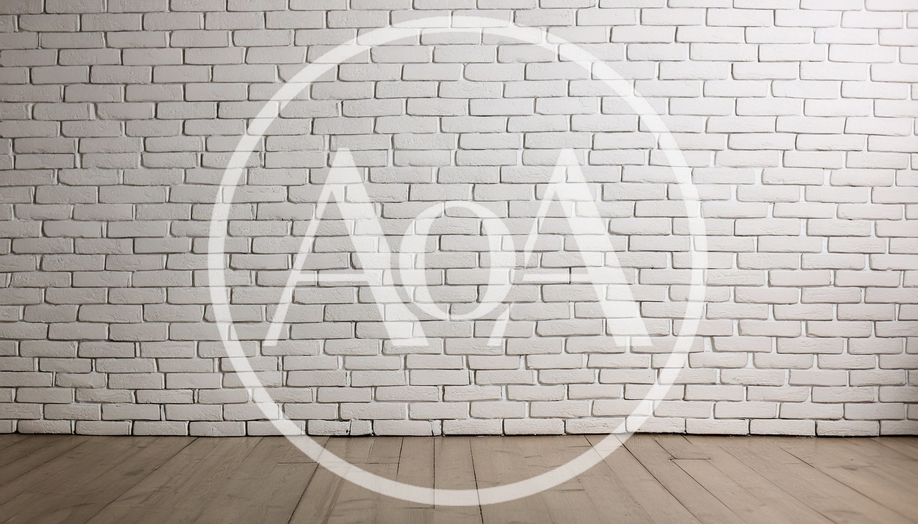 Empty Room With White Brick Wall And Wooden Floor
