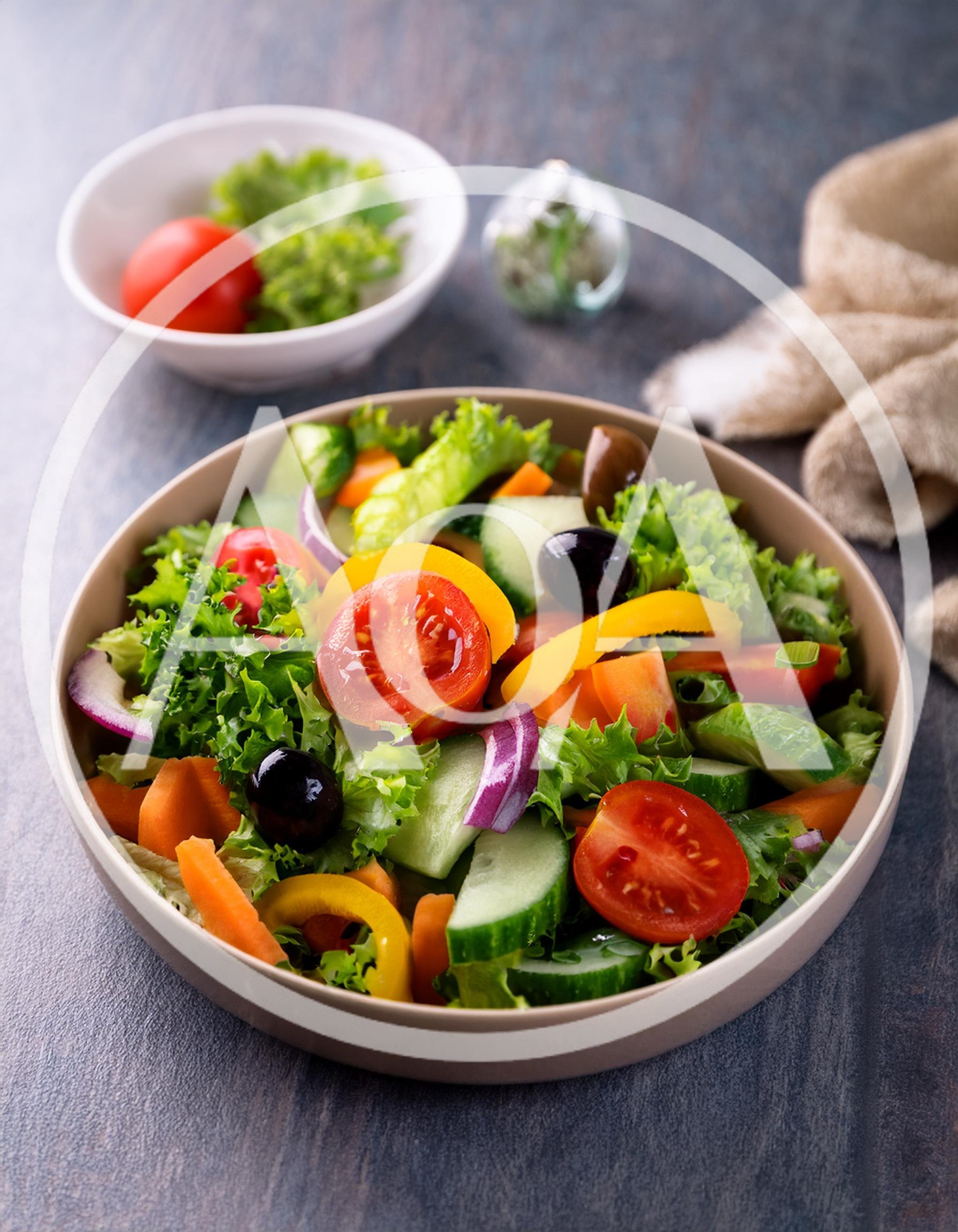 Fresh Vegetable Salad In A Ceramic Bowl