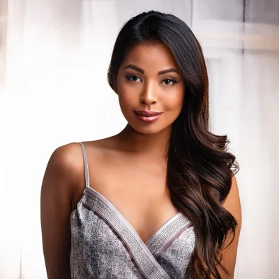 Portrait Of A Beautiful Young Woman With Long Hair