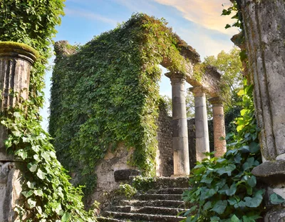 Ancient Stone Ruins Overgrown With Lush Green Ivy
