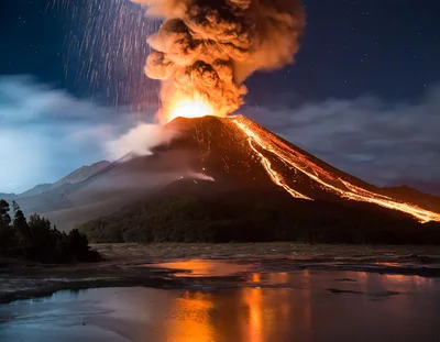 Volcanic Eruption With Lava Flow At Night