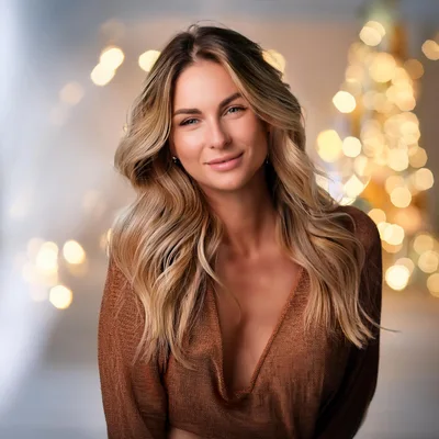 Portrait Of A Beautiful Blonde Woman With Bokeh Lights