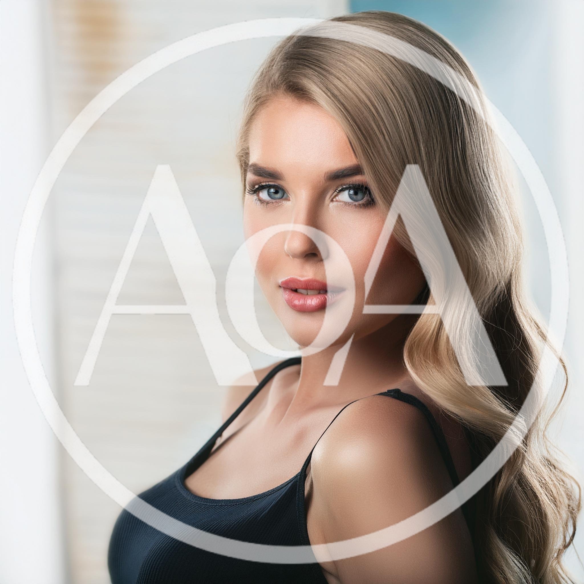 Portrait Of A Beautiful Blonde Woman With Wavy Hair