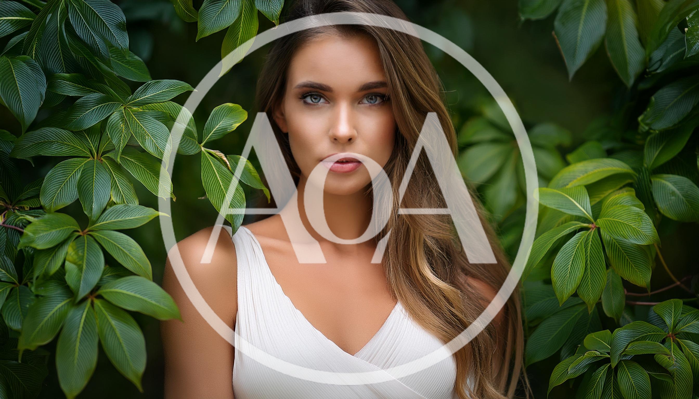 Portrait Of A Beautiful Woman Amidst Lush Green Foliage