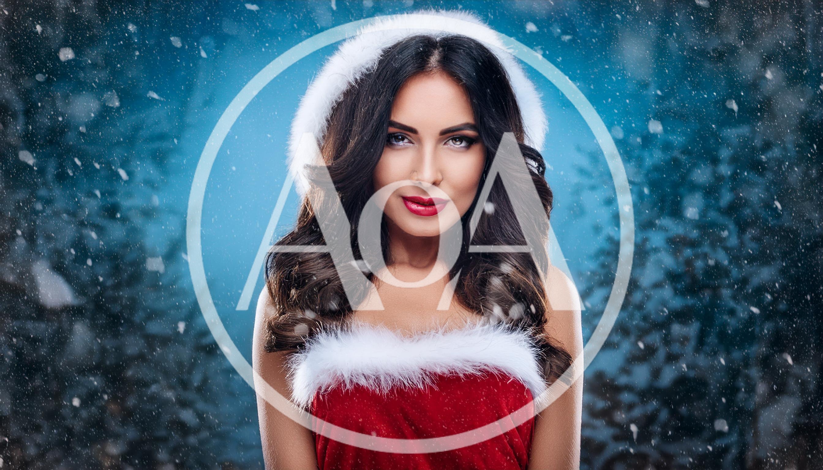 Beautiful Woman Wearing Santa Claus Costume In Snowy Forest