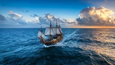 Historic Tall Ship Sailing Across Open Ocean