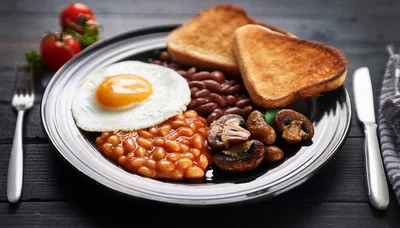 Traditional English Breakfast Plate With Fried Egg And Beans
