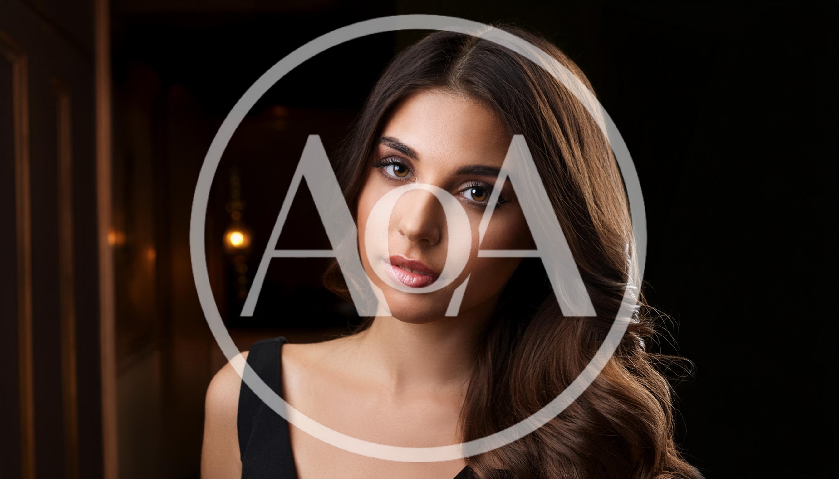 Portrait Of A Beautiful Young Woman With Wavy Hair