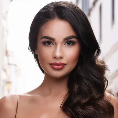 Portrait Of A Beautiful Woman With Long Wavy Hair