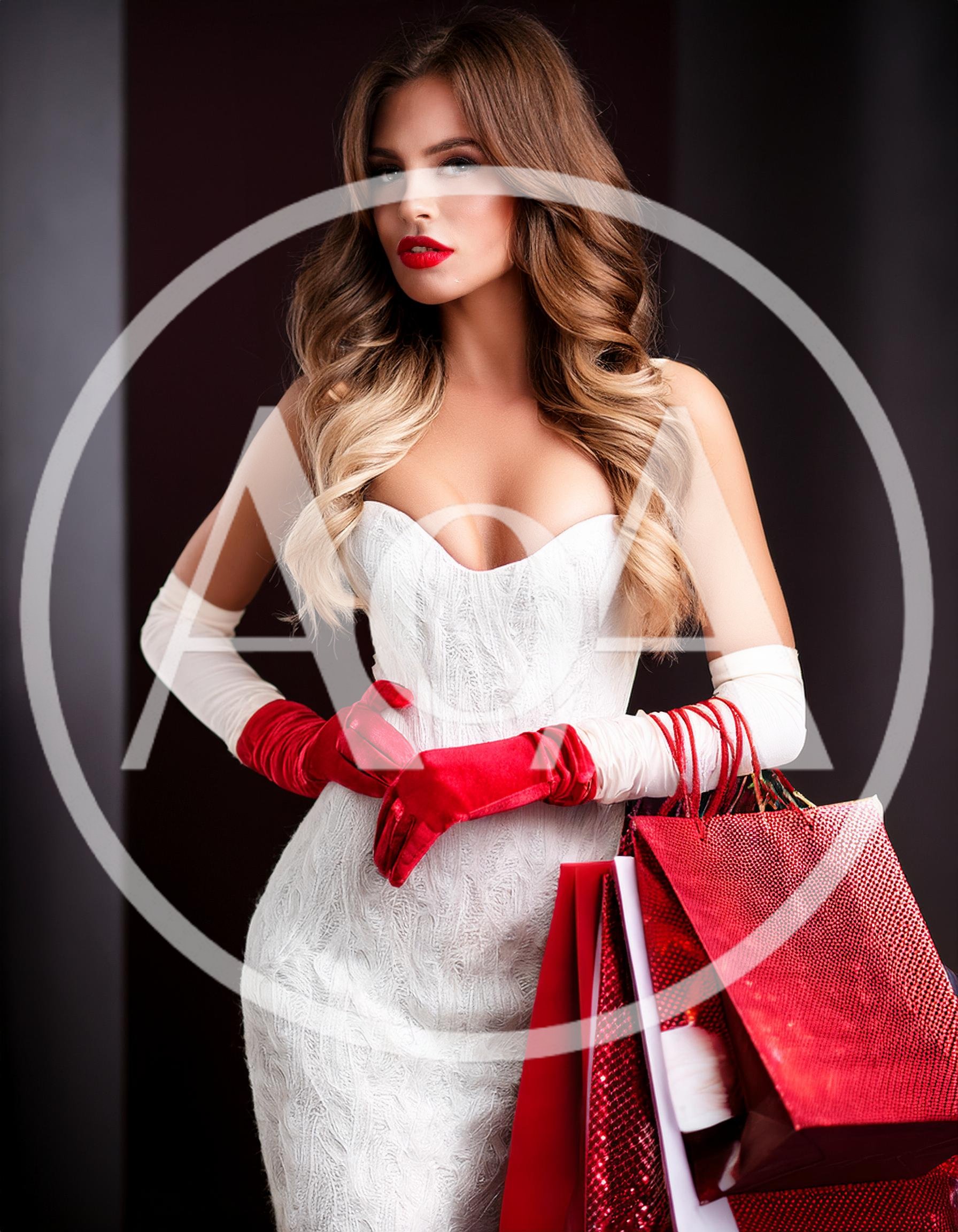 Elegant Woman Holding Red Shopping Bags