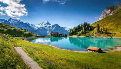 Bachalpsee Lake With Mountain Peaks In Swiss Alps