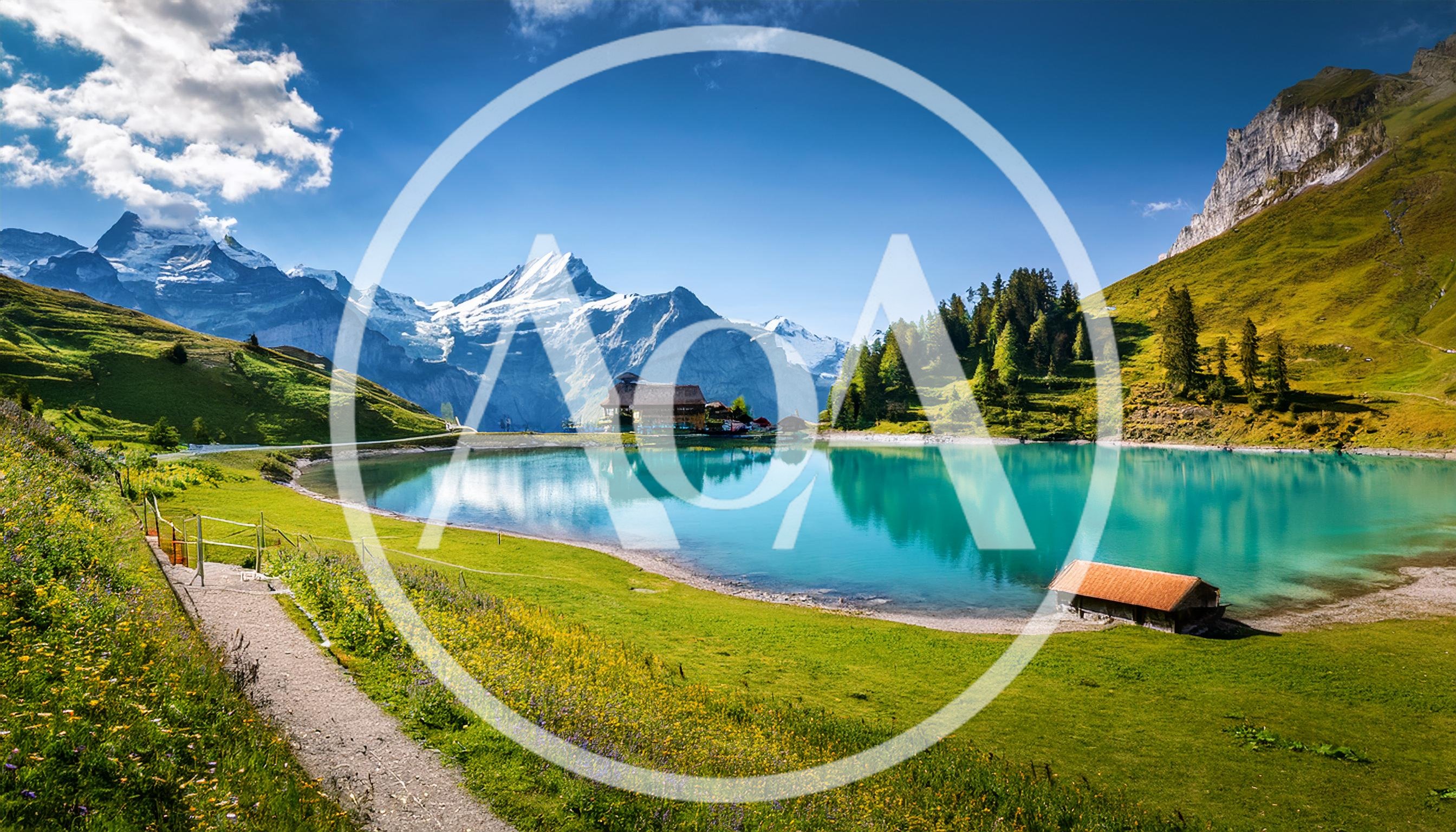 Bachalpsee Lake With Mountain Peaks In Swiss Alps