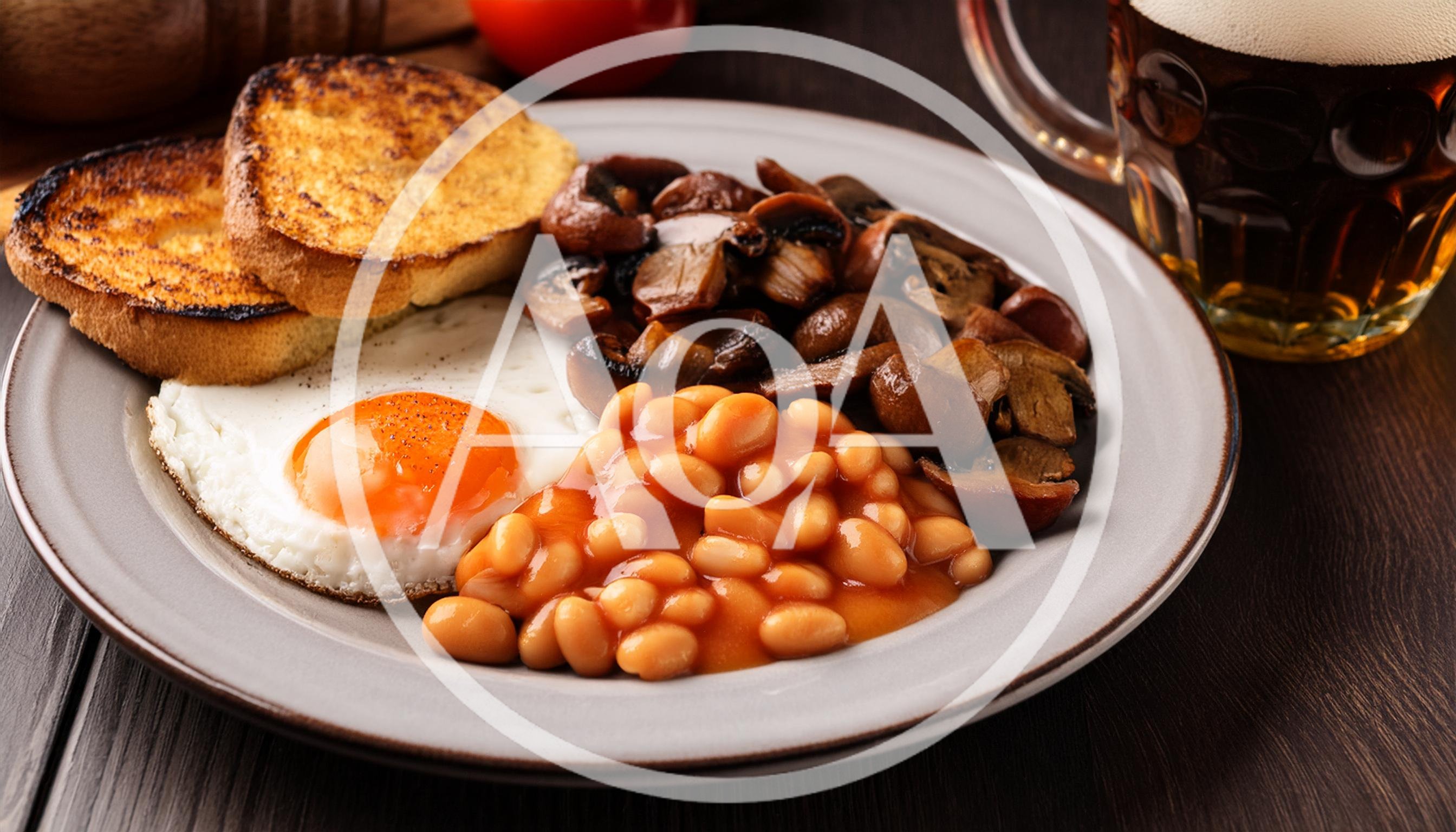 Traditional English Breakfast Plate With Fried Egg And Beans