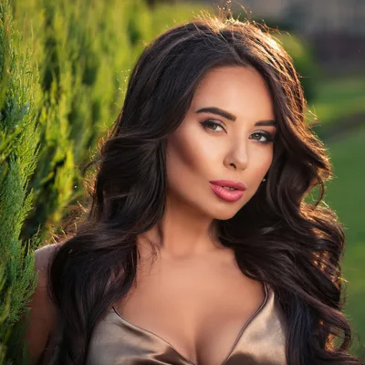 Portrait Of A Beautiful Woman With Long Wavy Hair