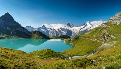 Bachalpsee Lake With Eiger And Schreckhorn Peaks In Switzerland