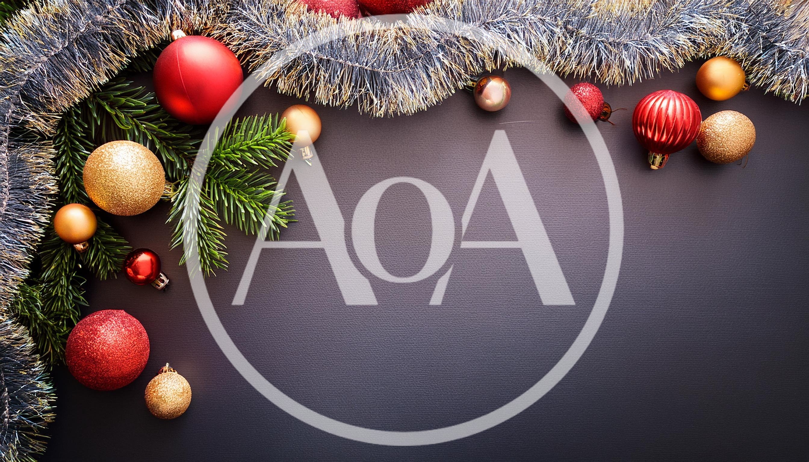 Christmas Ornaments and Pine Branches on Dark Background