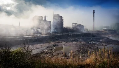 Abandoned Industrial Factory Ruins In Thick Morning Fog