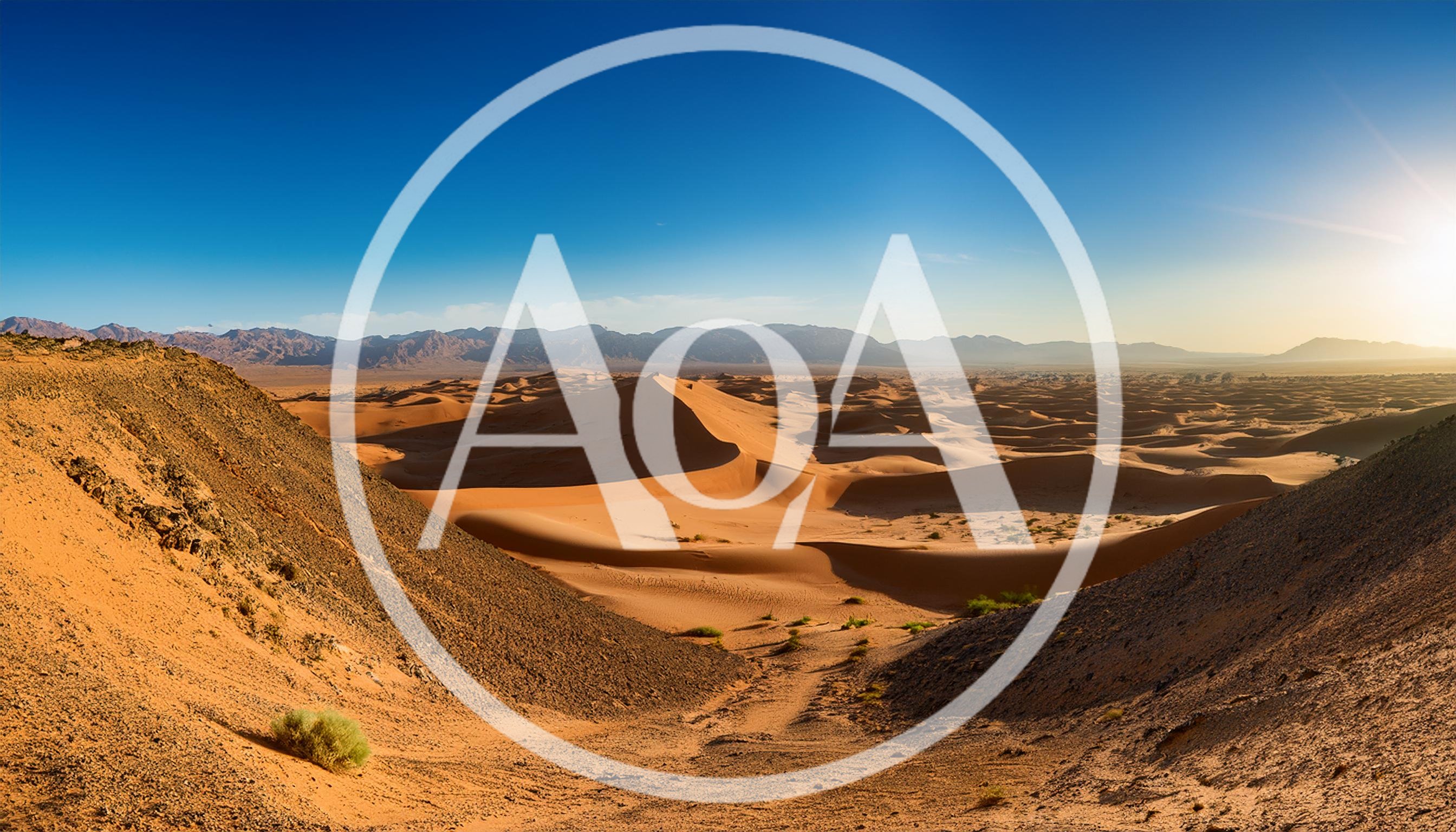 Panoramic View Of Vast Desert Sand Dunes At Sunset