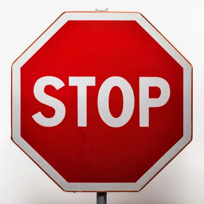 Standard Red Octagonal Stop Sign On White Background