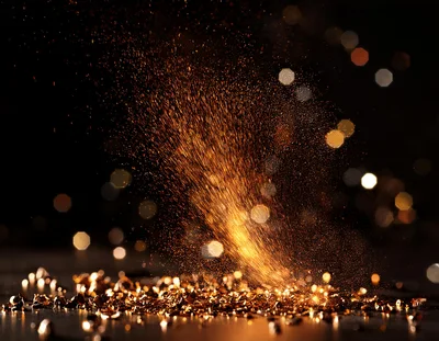 Golden Sparks Erupting From Metal Grinding Process