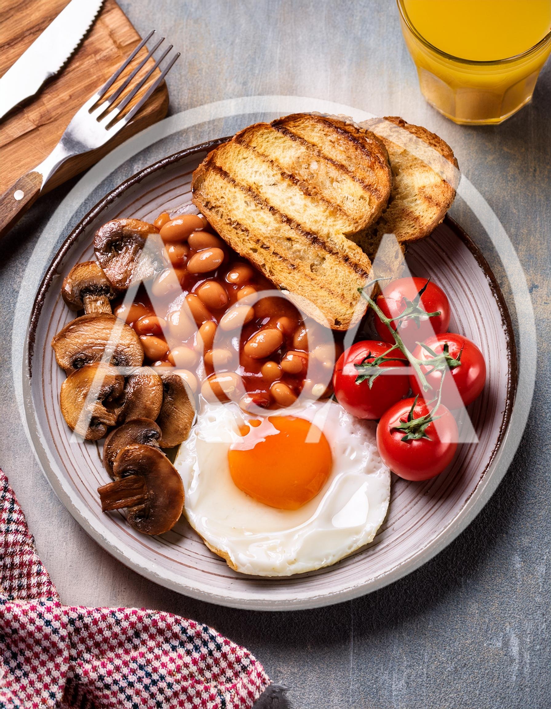 Traditional English Breakfast Plate with Fried Egg and Beans