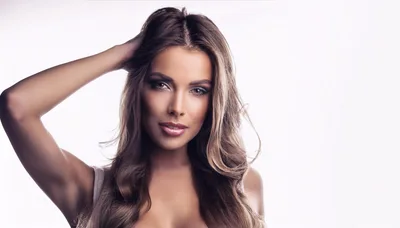Portrait Of A Beautiful Young Woman With Long Hair