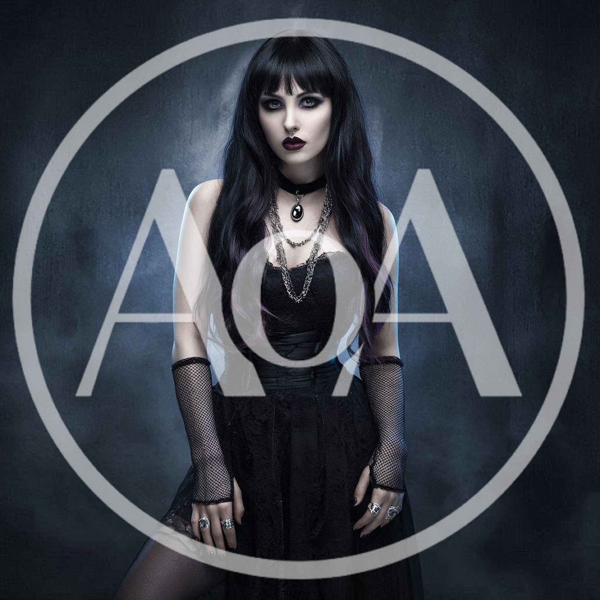 Gothic Woman With Long Dark Hair In Studio Portrait