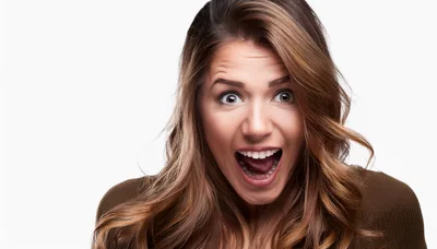 Surprised Woman With Wide Open Mouth And Expressive Eyes