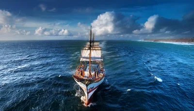 Tall Ship Sailing On Open Ocean