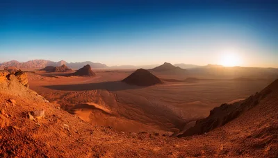 Panoramic View Of Wadi Rum Desert At Sunset