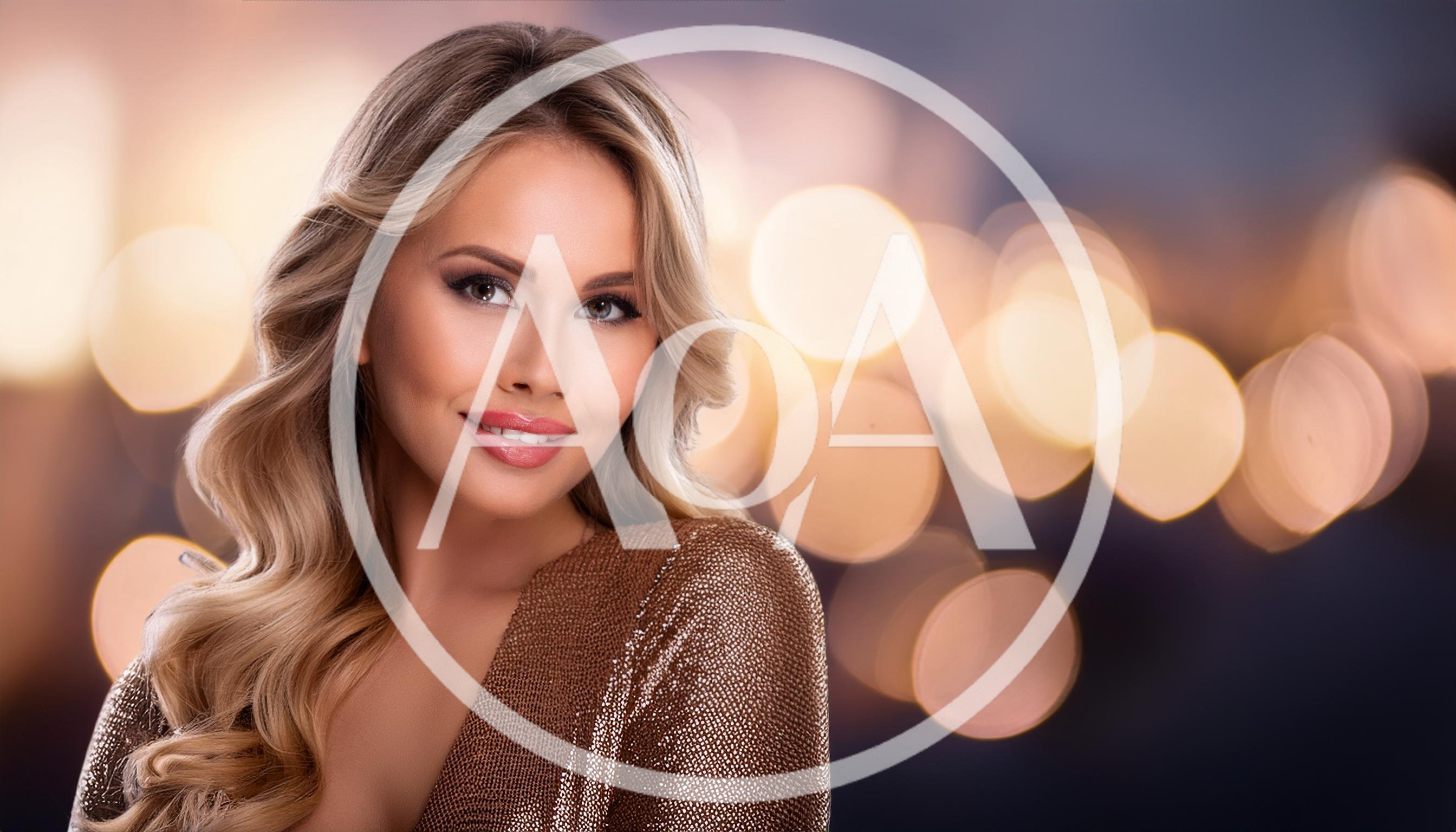 Beautiful Blonde Woman In Gold Dress With Bokeh Background