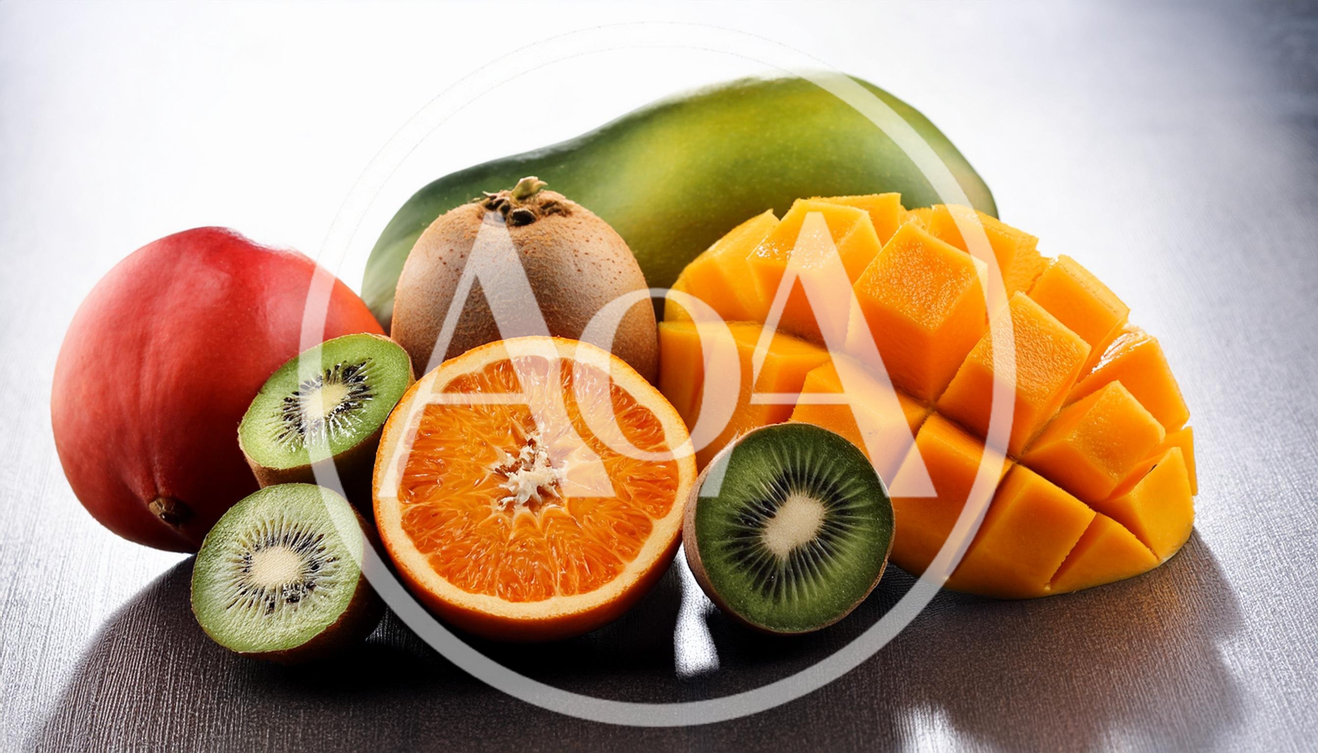Assorted Tropical Fruits Including Mango Kiwi And Orange