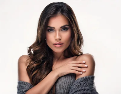 Portrait Of A Beautiful Woman In A Grey Sweater